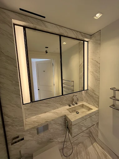 Powerline Group illuminated bathroom mirror installation in London